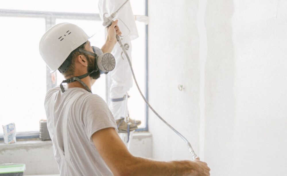 Professional painters painting a commercial building interior