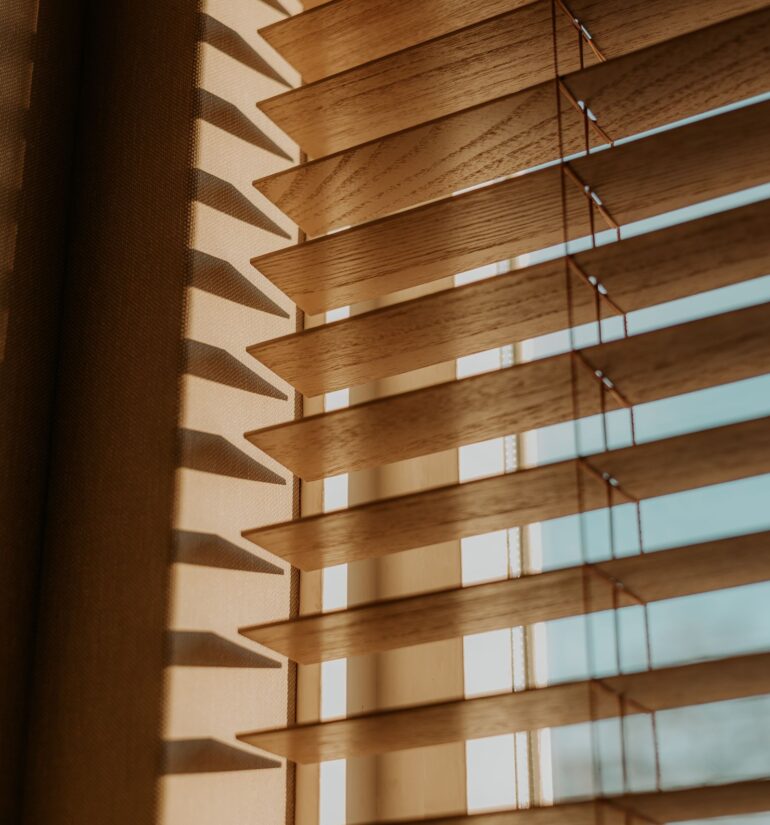 Wooden blinds and window coverings installed in a Calgary home