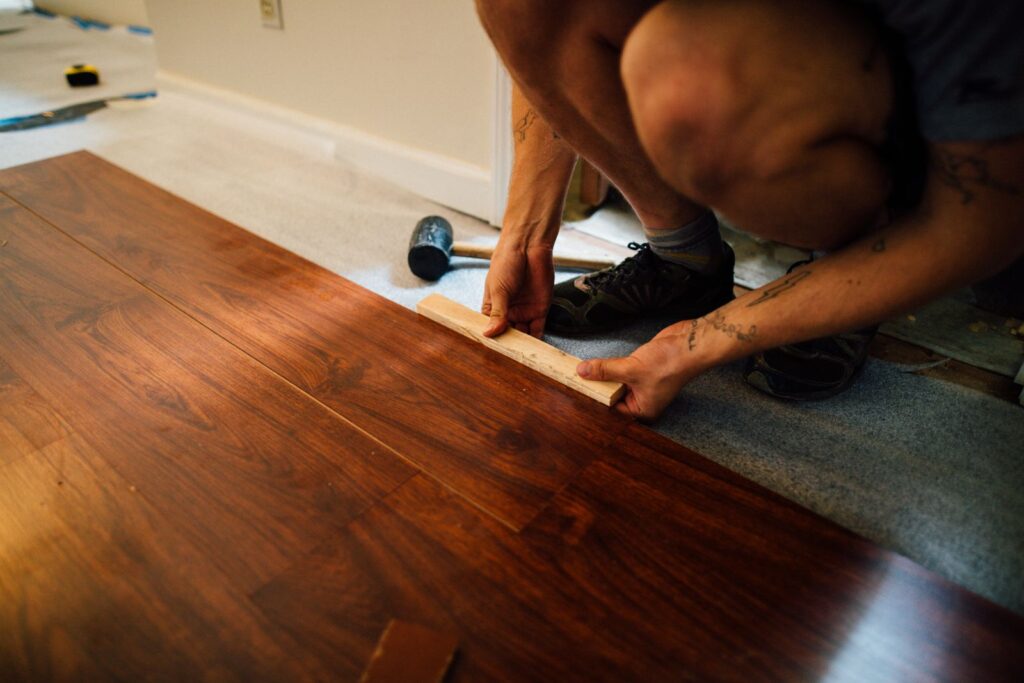 New wood flooring installed in a Calgary condo lobby by YYC Upgrades